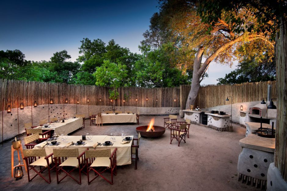 Experience a boma dinner in the heart of the African wilderness