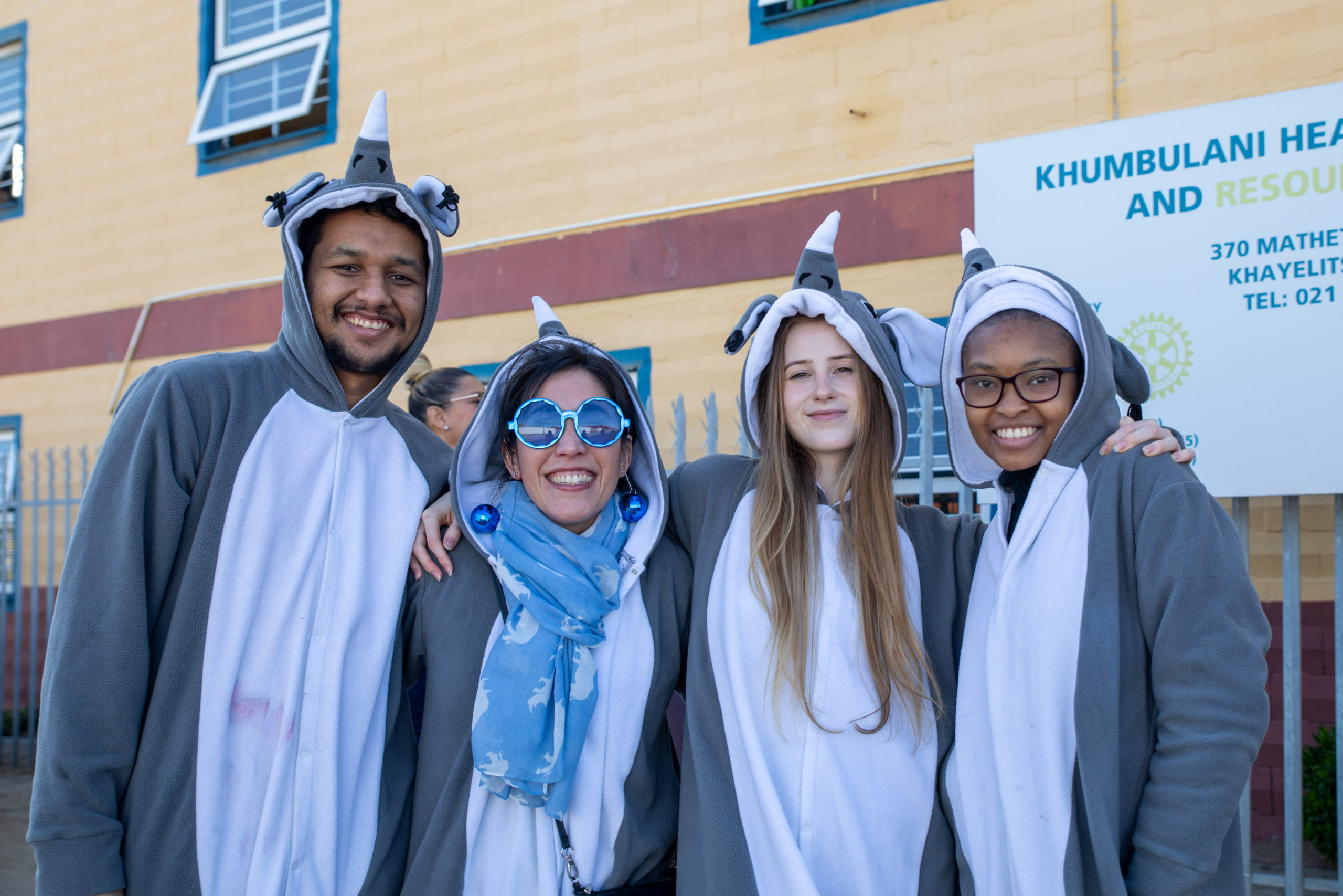 Rhino Africa team dressed in rhino onesies