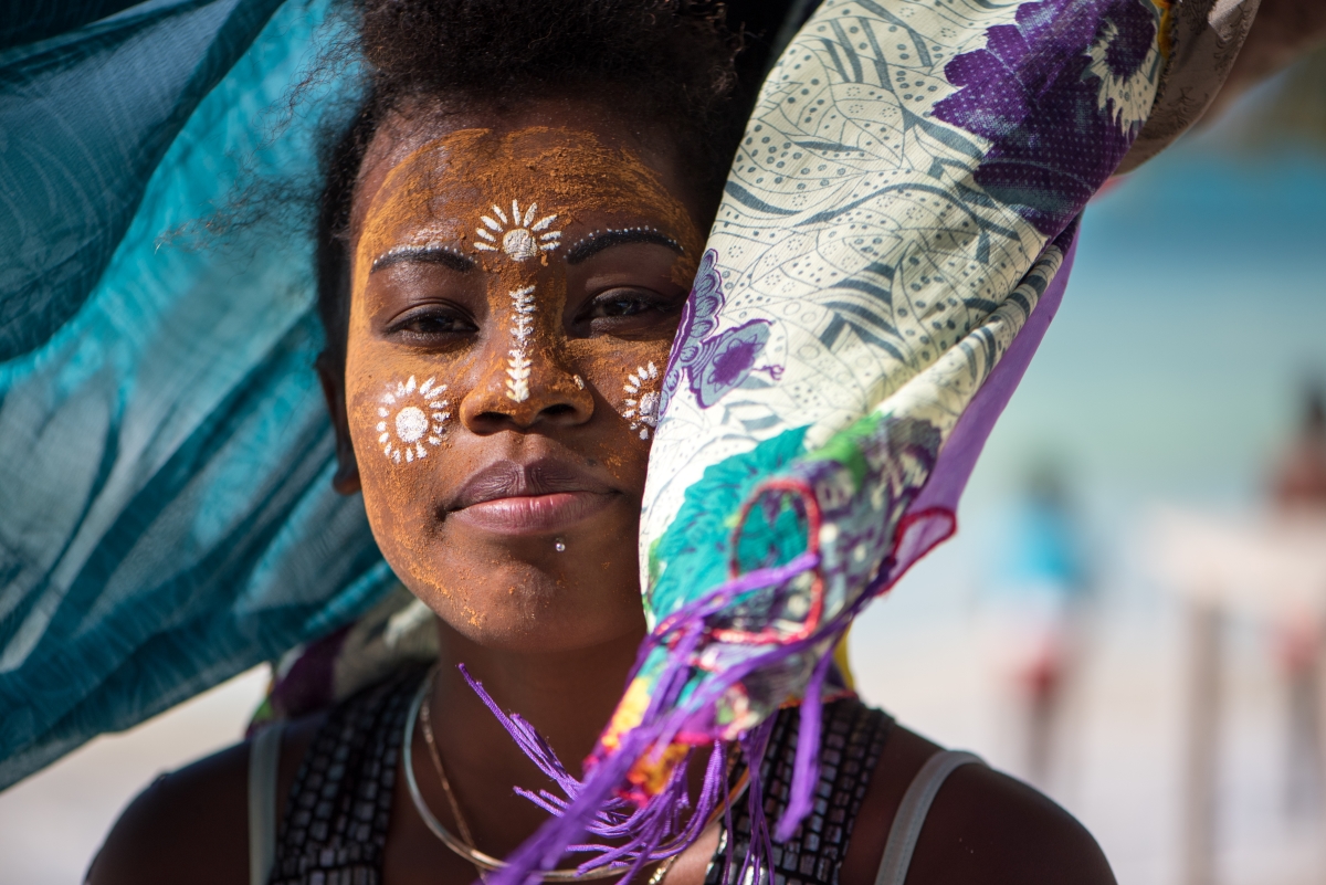 Local Malagasy woman in cultural attire and facepaint