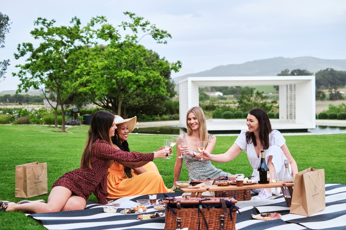 Four women enjoying a summer picnic