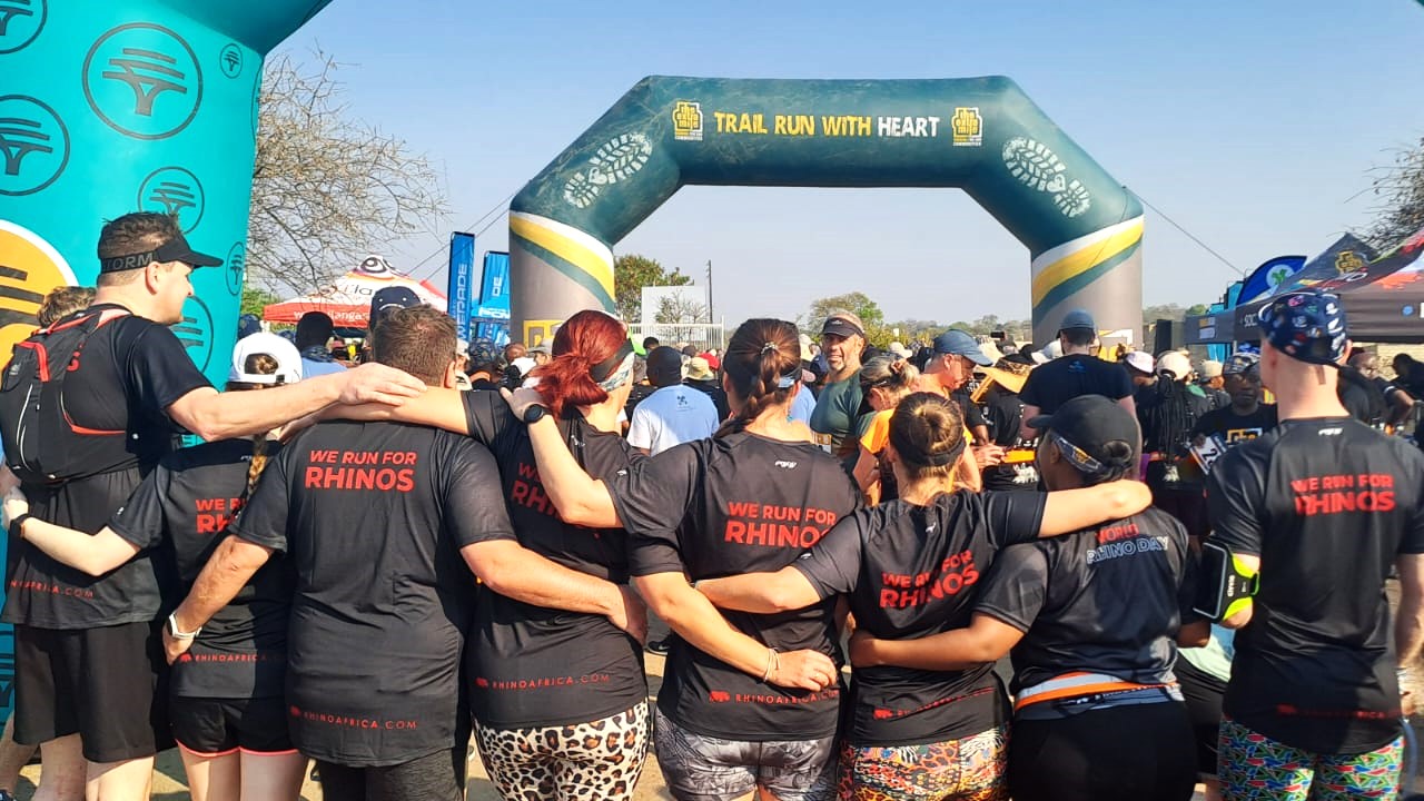 Eight members of the Rhino Crash waiting in anticipation at the starting line