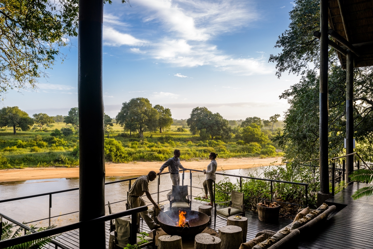 Singita Ebony Lodge deck with firepit and stunning views of the river