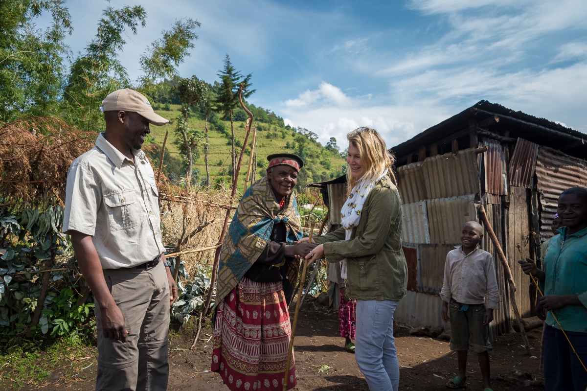 Guest interacting with a village elder