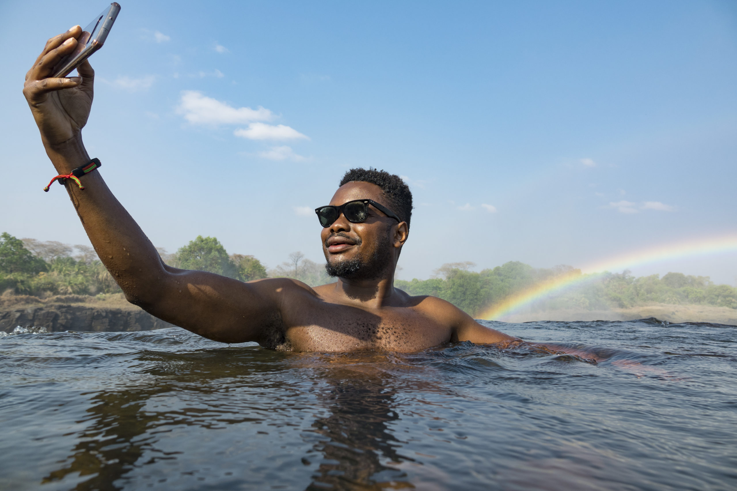 Take a selfie in serene waters resting on the cusp of a ferocious drop