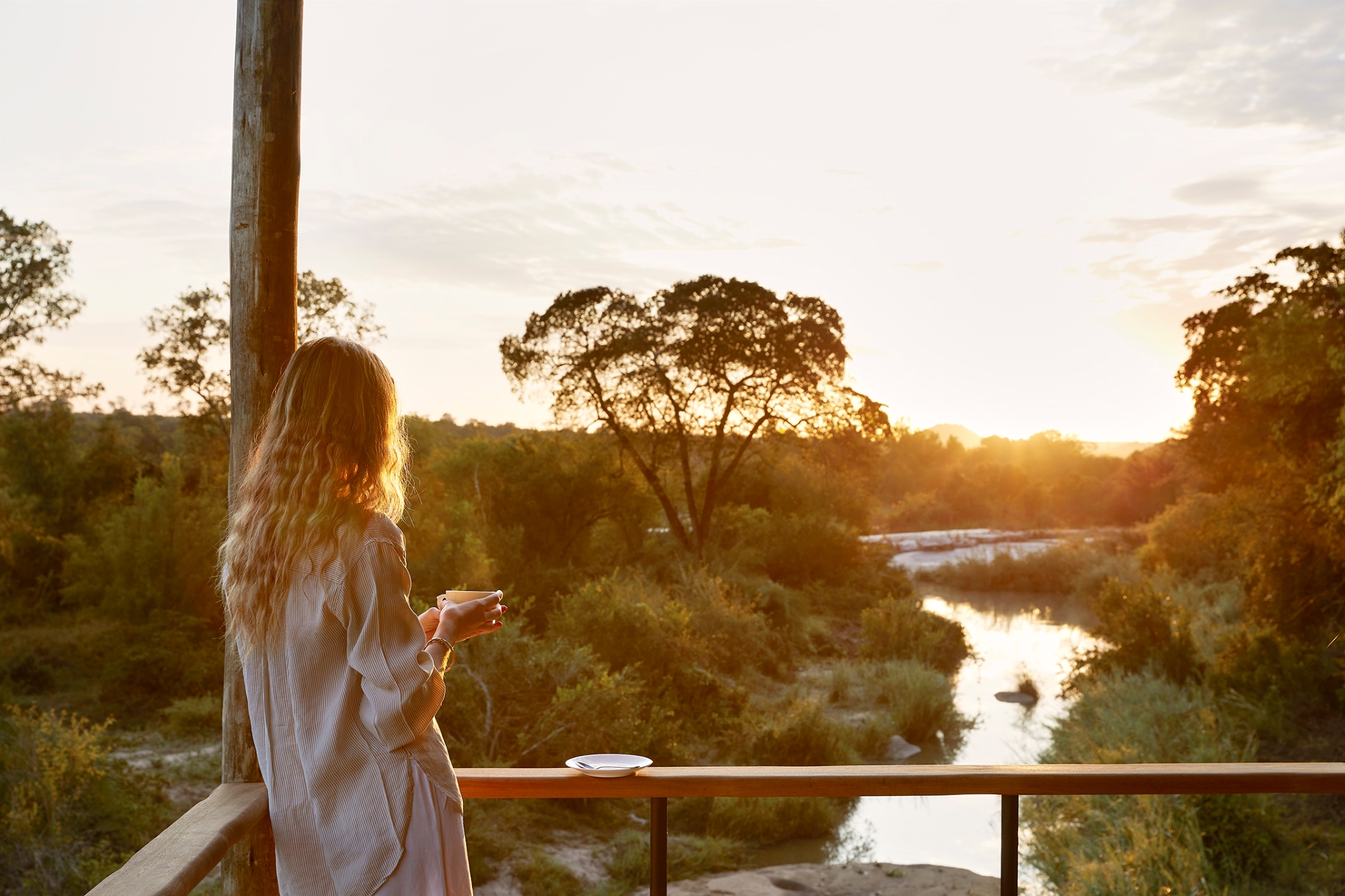 Woman taking a quiet moment to herself appreciating the views of the wilderness