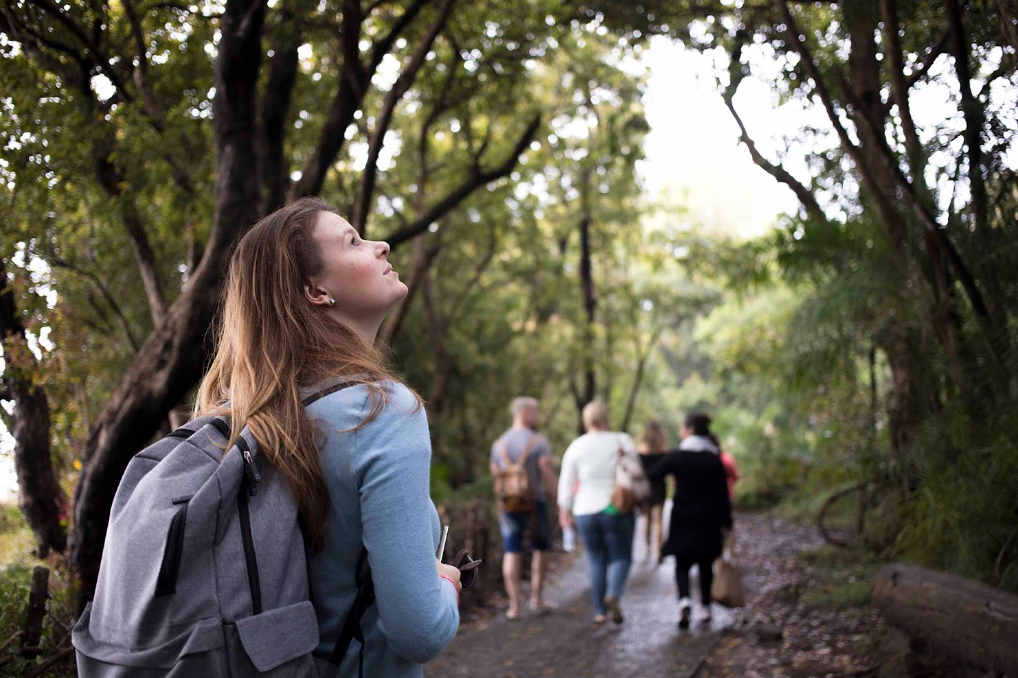 Allison Bothma, a Rhino Africa travel expert, exploring a forested area