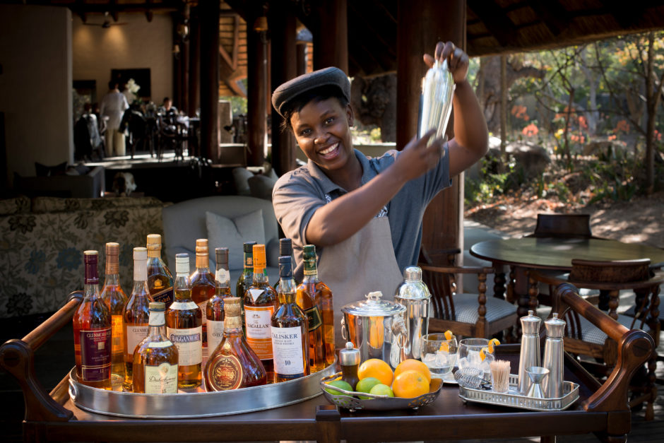 Barman and whiskey tasting service at andBeyond Ngala Safari Lodge